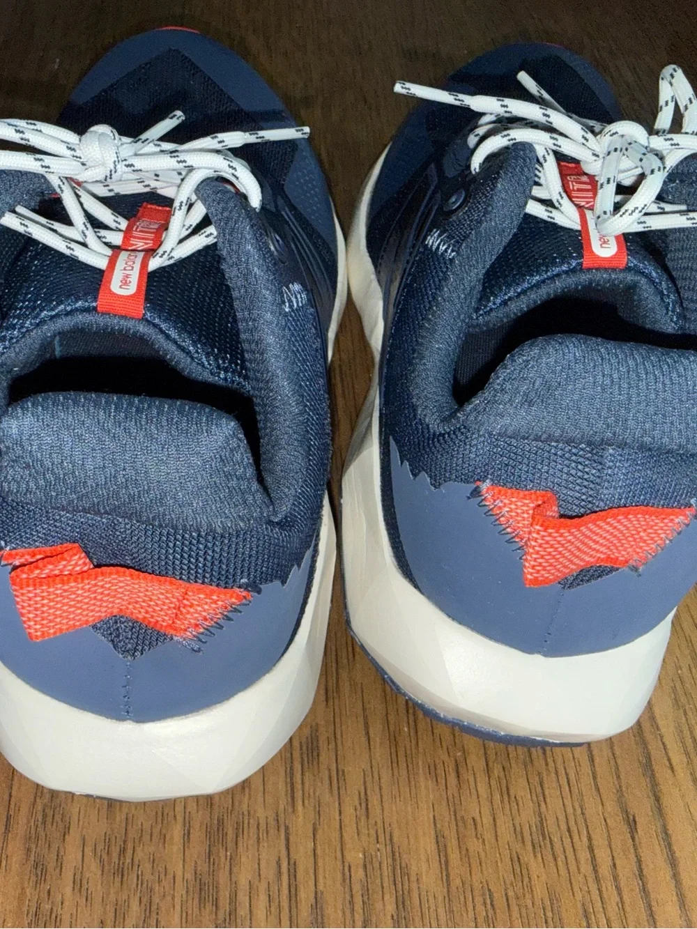 New Balance Navy and Red Sneakers